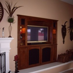 A built in a wall unit is a great alternative to entertainment center furniture