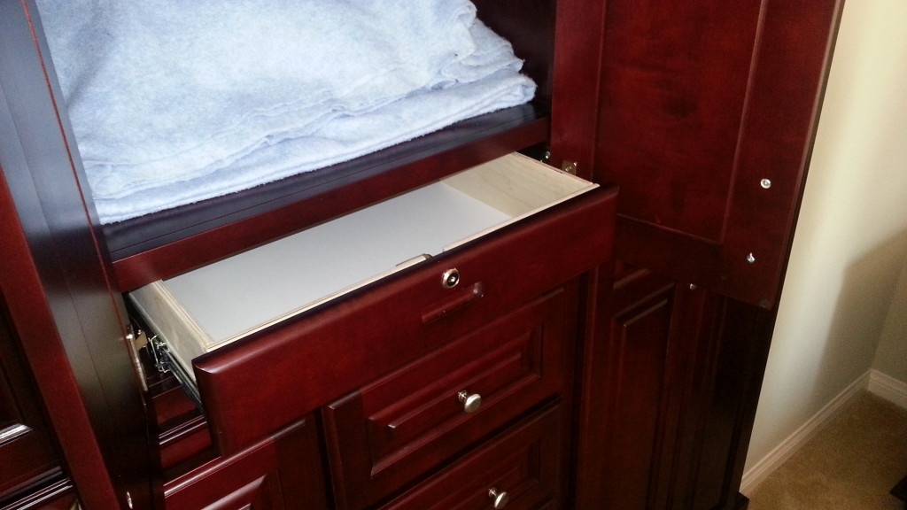 Locking interior drawers. Custom sized for Mr. and Mrs's needs.