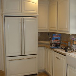White lacquer kitchen cabinetry designed for a kitchen in Southern California
