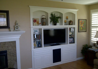 Custom entertainment center cabinet with arches