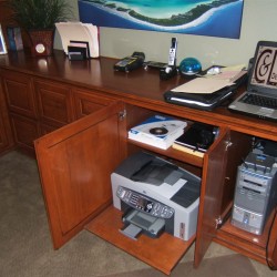 Built in home office with computer tower and printer storage built in.