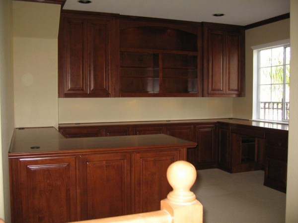 Home office with upper cabinets