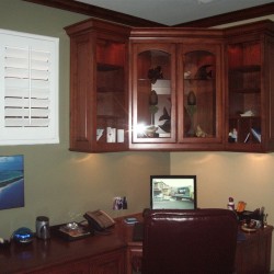 Custom library and home office in Corona with built in shelves and custom desk.