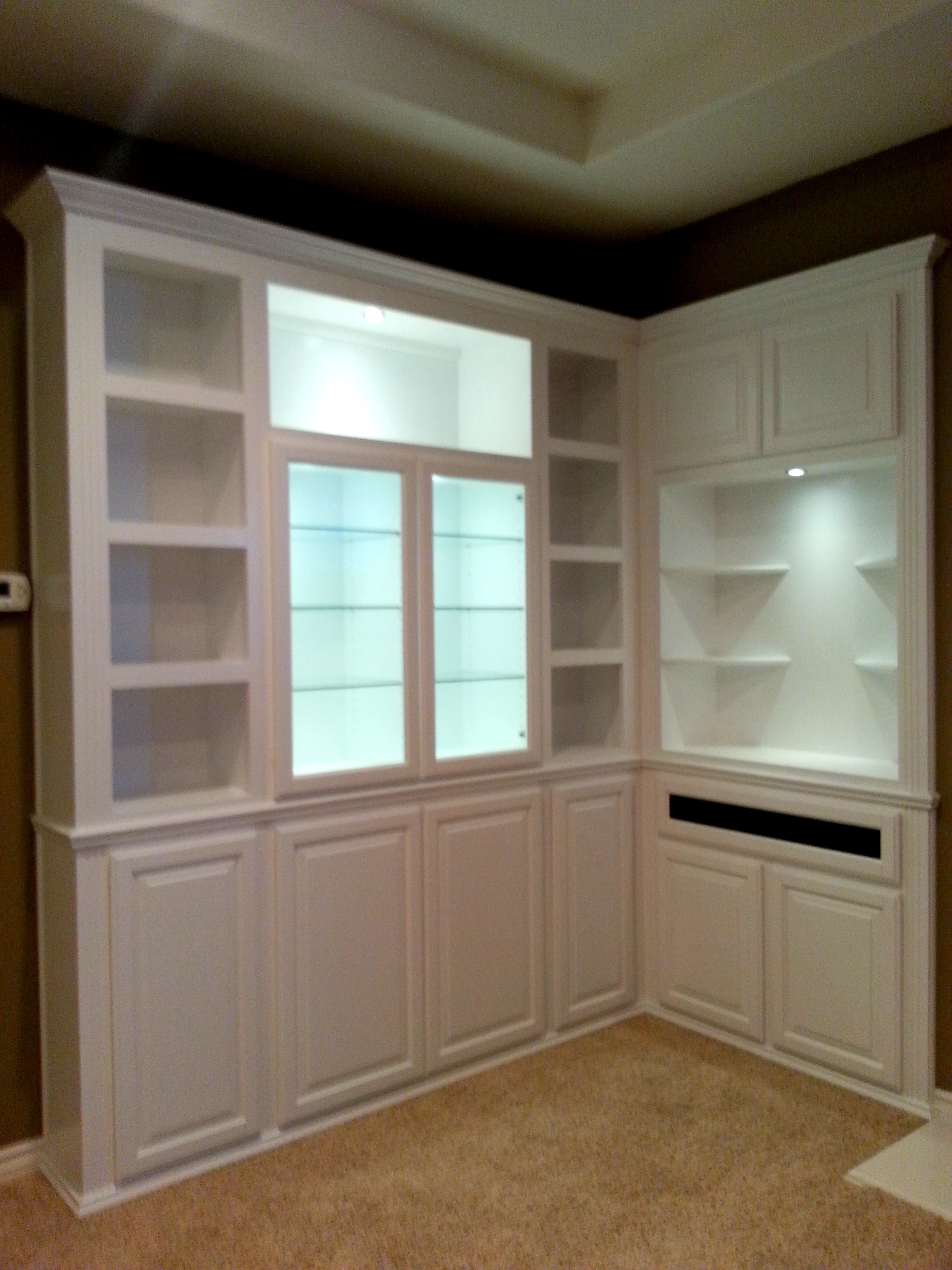 Built in white corner cabinets