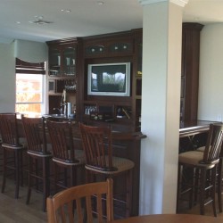 This family room bar built in Temecula California adds a four star steakhouse atmosphere.