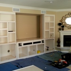 The interior of our custom cabinets and stained or painted the same as outside finish.